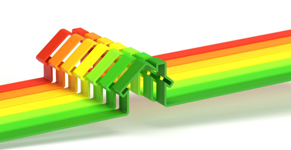 Regenboog met huizen in de kleuren van een energielabel
